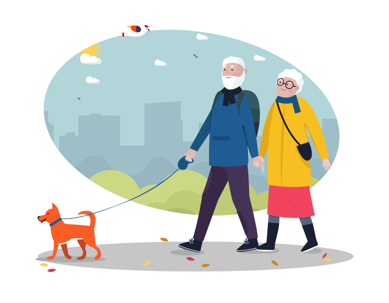 älteres Pärchen geht mit ihrem Hund spazieren